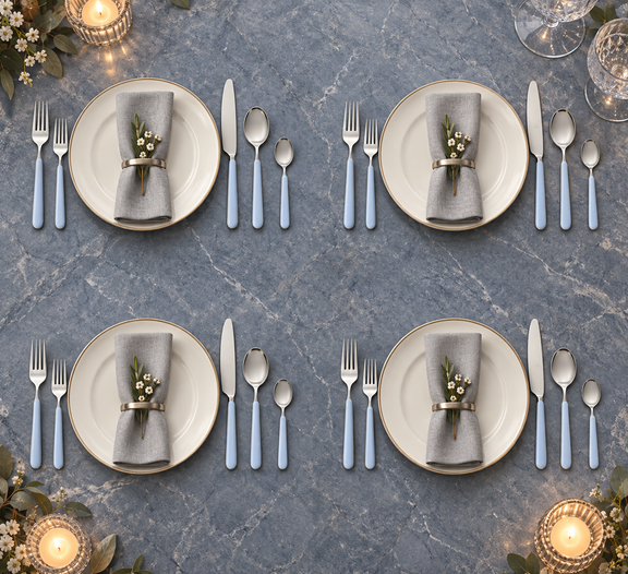 Mepra Fantasia Ice Oro Light Blue 20-piece flatware displayed as four elegant evening place settings