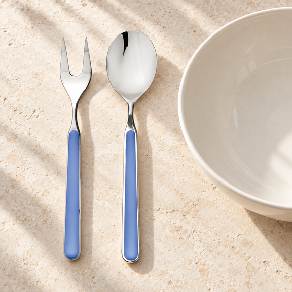 Mepra Fantasia Lavendal two-piece salad servers on light stone