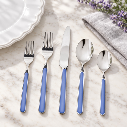 Mepra Fantasia Lavender five-piece flatware on pale marble