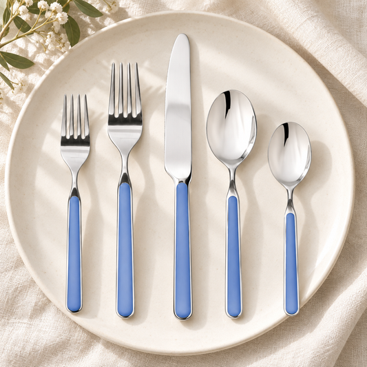 Mepra Fantasia Lavender five-piece flatware on ivory plate and cream linen