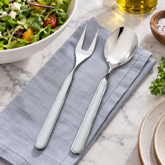 Mepra Fantasia Light Blue two-piece serving set in a premium dining lifestyle scene